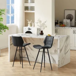 ImpiaTabouret design coque matelassée patinée et pieds en métal noir><noscript><img width=